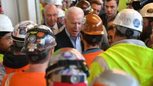 Joe Biden tells factory worker ‘you’re full of s—‘ during a tense argument over guns