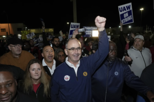 Workers are on strike at all 3 Detroit auto makers for the first time in their union’s history